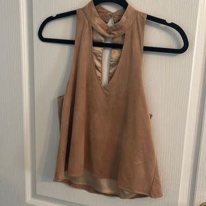 Tan suede top.